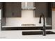 Kitchen island features a matte black faucet and sink at 1336 E Cherrywood Pl, Chandler, AZ 85249