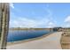 Picturesque community lake with walking path and gazebo, perfect for outdoor enjoyment at 1380 W Ridge Rd, Apache Junction, AZ 85120