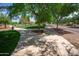 Well-maintained park path perfect for a leisurely stroll or jog in a tranquil setting at 14640 W Dahlia Dr, Surprise, AZ 85379