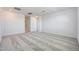 Spacious bedroom with plush carpeting and neutral walls, leading to an open doorway at 14739 W El Cortez Pl, Surprise, AZ 85387