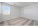 Light filled bedroom with plush carpeting, and a bright window provides a clean and bright atmosphere at 14739 W El Cortez Pl, Surprise, AZ 85387