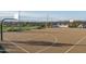 Enjoy a game of hoops on this community basketball court with mature landscaping and fencing at 15911 W Montana De Oro Dr, Surprise, AZ 85387