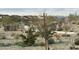 Scenic community park with desert landscaping, manicured paths, native trees, and green spaces at 15911 W Montana De Oro Dr, Surprise, AZ 85387