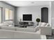 Well-lit living room featuring neutral furniture and minimalist decor at 15911 W Montana De Oro Dr, Surprise, AZ 85387