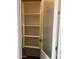 Walk-in pantry with frosted door and ample shelving for organized storage of goods at 15911 W Montana De Oro Dr, Surprise, AZ 85387