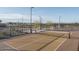 Outdoor pickleball court featuring new nets and paved court lines, perfect for a friendly game at 15911 W Montana De Oro Dr, Surprise, AZ 85387