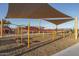 A fun play area with various playground equipment and shaded seating for relaxed Gathering time at 15911 W Montana De Oro Dr, Surprise, AZ 85387