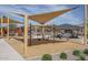 Neighborhood playground with swings, picnic areas, and slides, perfect for Gathering outdoor activities at 15911 W Montana De Oro Dr, Surprise, AZ 85387