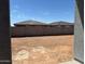 A backyard with a wall, perfect for a Gathering or pets at 16077 W Remuda Dr, Surprise, AZ 85387