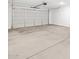 A spacious two car garage with high ceilings at 16077 W Remuda Dr, Surprise, AZ 85387