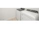 Convenient laundry room equipped with modern, energy-efficient washer and dryer at 16077 W Remuda Dr, Surprise, AZ 85387