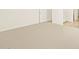 Neutral bedroom featuring new carpet, white walls, and natural light at 16080 W Prickly Pear Trl, Surprise, AZ 85387