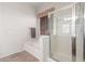 Bright bathroom featuring a bathtub and glass-enclosed shower at 17696 N 168Th Dr, Surprise, AZ 85374