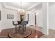 Inviting dining area with stylish chandelier and unique flooring, perfect for entertaining at 17696 N 168Th Dr, Surprise, AZ 85374