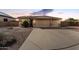 Charming single-story home with a three-car garage and desert landscaping for low maintenance at 17696 N 168Th Dr, Surprise, AZ 85374