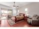 Spacious main bedroom with a ceiling fan and sliding glass doors leading to the backyard at 17696 N 168Th Dr, Surprise, AZ 85374