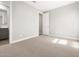 Bright bedroom with neutral carpeting and fresh paint at 17809 W Elm St, Goodyear, AZ 85395