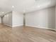 Bright and airy living room space with neutral walls and tile flooring at 17809 W Elm St, Goodyear, AZ 85395