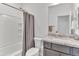 Bathroom featuring a tub/shower combination with updated fixtures and a granite-topped vanity at 18332 E Spring Valley Ct, Rio Verde, AZ 85263
