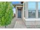 Inviting front entrance with a blue door and manicured landscaping at 18332 E Spring Valley Ct, Rio Verde, AZ 85263