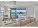 Stylish living room with large sliding glass doors leading to an outdoor patio at 18332 E Spring Valley Ct, Rio Verde, AZ 85263