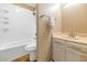 Neutral bathroom with a shower-tub combination, vanity and toilet at 2119 N Recker Rd, Mesa, AZ 85215