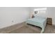 Spacious bedroom with large window for natural light and an area rug at 2119 N Recker Rd, Mesa, AZ 85215
