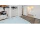 Bedroom with closet, access to the vanity, and gray area rug at 2119 N Recker Rd, Mesa, AZ 85215