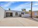 Charming single-story home with a private courtyard, desert landscaping and attached carport at 2119 N Recker Rd, Mesa, AZ 85215