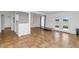 Open concept living room with tile flooring and a glass door that leads to the backyard at 2119 N Recker Rd, Mesa, AZ 85215
