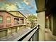 View of the property's exterior, showcasing its architecture and lovely curb appeal against a dramatic sky at 2150 E Bell Rd # 1113, Phoenix, AZ 85022