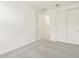 Bedroom with neutral carpet, large closet and white walls offers a clean, blank canvas at 24467 W Grenadine Rd, Buckeye, AZ 85326
