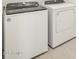 Modern white washer and dryer set; convenient laundry area at 24467 W Grenadine Rd, Buckeye, AZ 85326