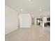 Expansive living space features bright natural light and seamlessly connects to modern kitchen at 24467 W Grenadine Rd, Buckeye, AZ 85326