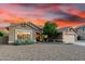 Charming single-story home featuring a low-maintenance desert landscape and a convenient two-car garage at 28802 N 45Th St, Cave Creek, AZ 85331