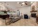 Open living space features a stone fireplace, modern lighting, and neutral decor is perfect for relaxation at 28802 N 45Th St, Cave Creek, AZ 85331