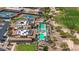 Resort-style community pool featuring shaded seating, palm trees, and a well-manicured landscape at 301 S 225Th Ave, Buckeye, AZ 85326