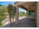 Covered patio with fan and landscape views at 301 S 225Th Ave, Buckeye, AZ 85326