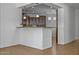 Open-concept kitchen showcasing ample counter space and seamless flow at 301 S 225Th Ave, Buckeye, AZ 85326