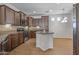 Well-equipped kitchen with plenty of storage and stainless steel appliances at 301 S 225Th Ave, Buckeye, AZ 85326