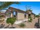 Well-maintained home showcasing desert landscaping, textured stucco, and privacy at 301 S 225Th Ave, Buckeye, AZ 85326