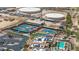 Aerial view of tennis courts, pool, and community center at 301 S 225Th Ave, Buckeye, AZ 85326