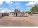 Spacious backyard featuring a covered patio, offering a blank canvas for landscaping ideas at 311 N Henkel --, Mesa, AZ 85201