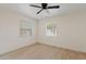 Bedroom featuring hardwood floors, ceiling fan, and two windows at 311 N Henkel --, Mesa, AZ 85201