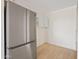 Kitchen features a stainless steel Samsung refrigerator and white cabinets, offering plenty of storage space at 311 N Henkel --, Mesa, AZ 85201