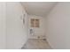 Minimalist utility room showcasing water lines and a window at 311 N Henkel --, Mesa, AZ 85201