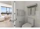 Bathroom showing a toilet, towel rack, and bedroom through the doorway at 312 E Windsor Ave # 3, Phoenix, AZ 85004
