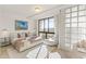 Bright bedroom featuring a large window with city views and stylish modern decor at 312 E Windsor Ave # 3, Phoenix, AZ 85004