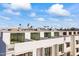 Aerial view of modern condos with expansive balconies overlooking distant mountains at 312 E Windsor Ave # 3, Phoenix, AZ 85004