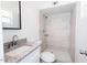 Updated bathroom featuring tiled shower, modern vanity, and neutral color scheme at 3128 N 40Th Ave, Phoenix, AZ 85019
